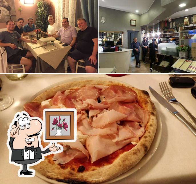 La foto della interni e cibo di Pizzeria Ristorante Notte Dì