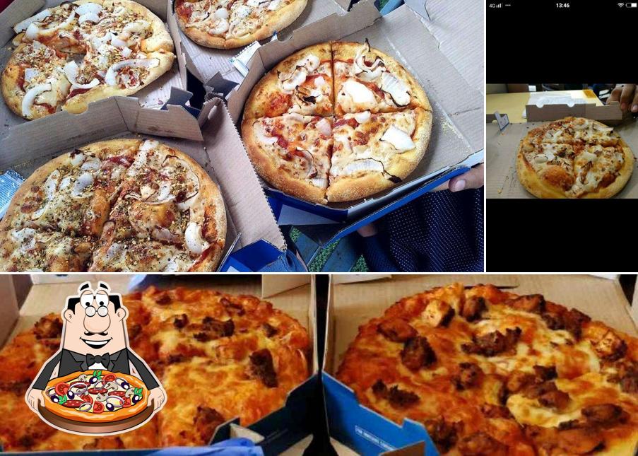 Try out pizza at Domino's Pizza