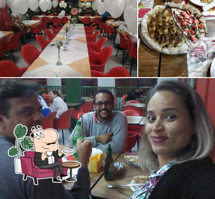 Dê uma olhada a foto apresentando interior e comida no Primo Piato Riacho Fundo