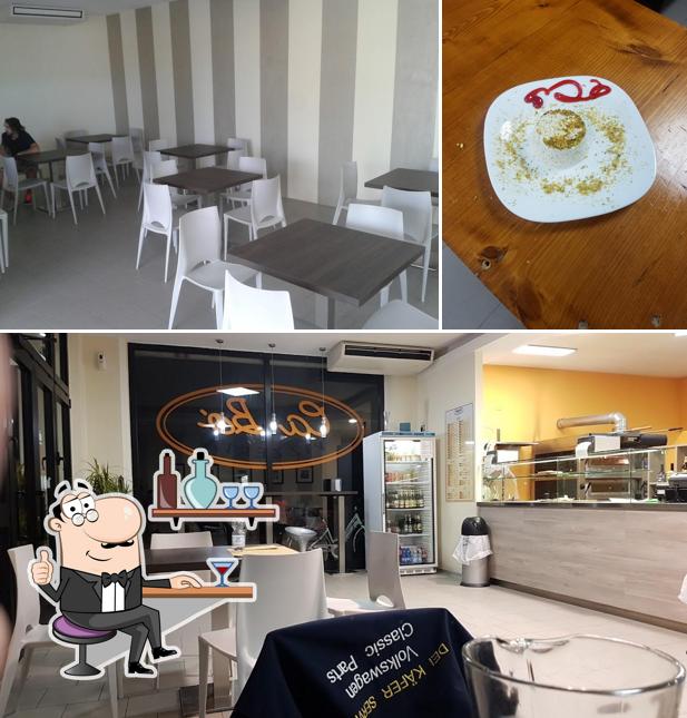 Siediti a un tavolo di Pizzeria Cabó