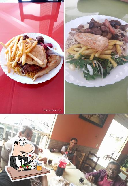 Entre diferentes coisas, comida e interior podem ser encontrados no Bel restaurante