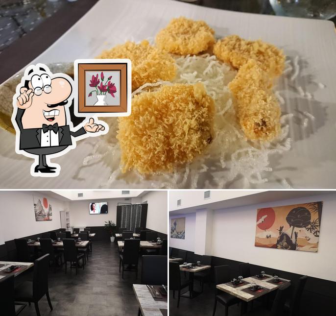 Guarda la foto che raffigura la interni e cibo di Chan Sushi Bar
