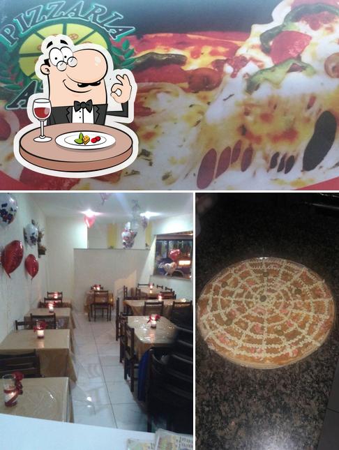 Comida em Pizzaria Aziz