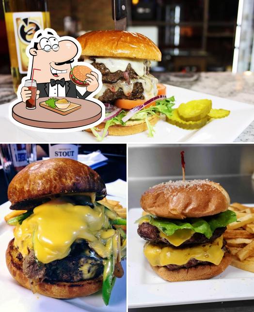 Order a burger at Dom's Tavern & Pizzeria