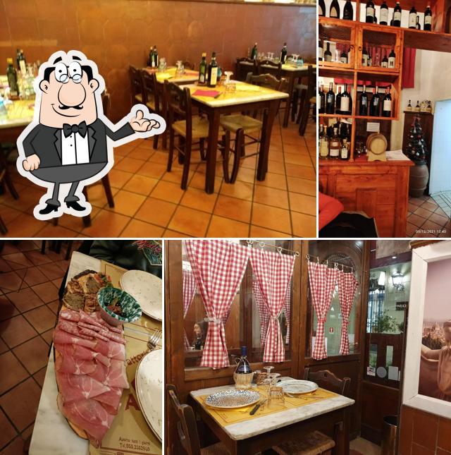 Installez-vous à l'une des tables de Trattoria Antichi Cancelli