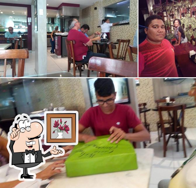O interior do Pizzaria Mil Delícias