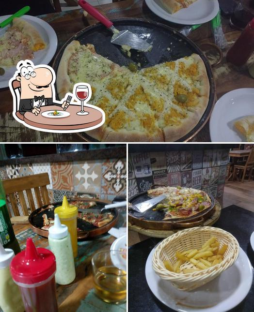 Entre diferentes coisas, comida e bebida podem ser encontrados a Pizzaria Max Burguer - Santa Maria