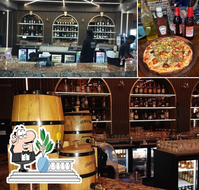Take a look at the photo displaying exterior and pizza at BEEP 2.0 GASTROPUB
