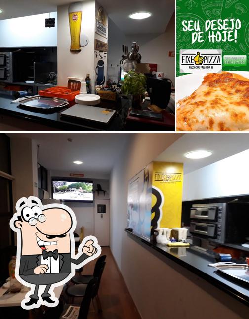 Entre diversos coisas, interior e pizza podem ser encontrados a Fixe Pizza