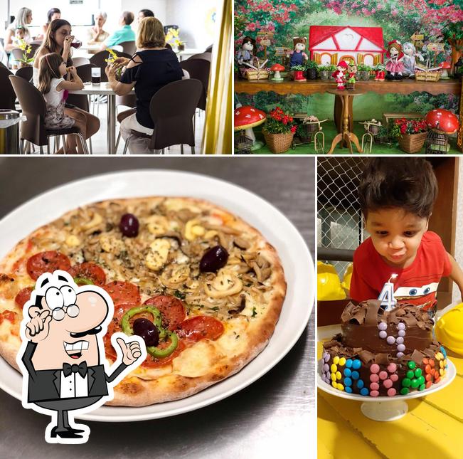 A imagem do Pizzaria Fabrincando’s interior e comida