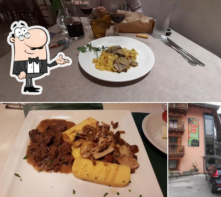 Questa è la immagine che raffigura la interni e cibo di Ristorante Al Ponte