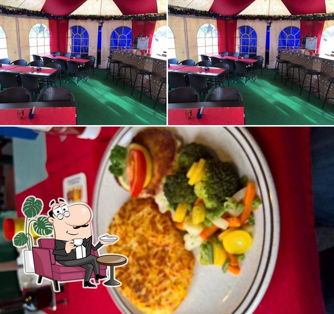 Guarda la foto che presenta la interni e cibo di Restaurant Passage