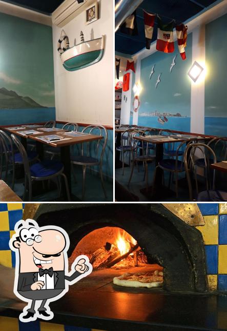 Installez-vous à l'une des tables de Piccola Ischia Pizzeria (Viale Abruzzi)