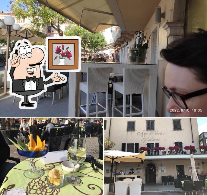 Siediti a un tavolo di Caffe Al Porto