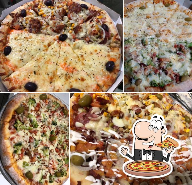 Peça pizza no Pastelaria e Pizzaria Turma Da Vila