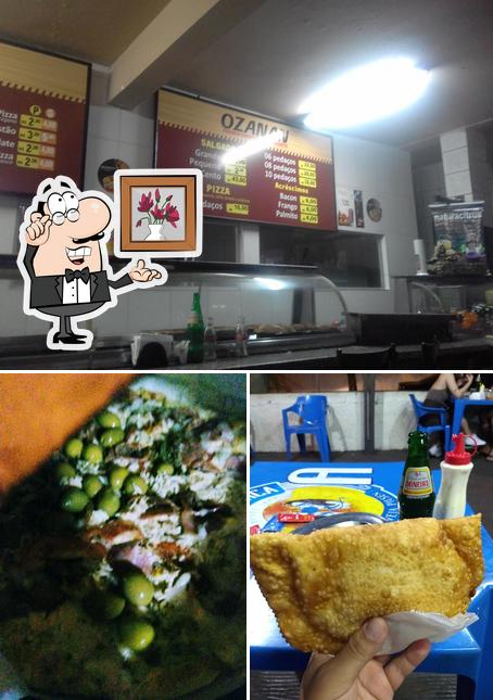 Entre diferentes coisas, interior e comida podem ser encontrados no Pizzaria e Lanchonete Ozanan