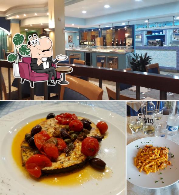 Dai un'occhiata agli interni di Trattoria Pizzeria Sorrento