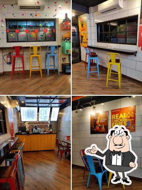 Take a seat at one of the tables at Milkshake And Co