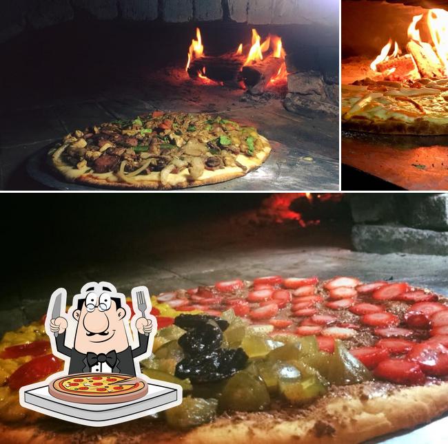 Peça pizza no Cocina Uruguaya Pizzaria e Chiviteria