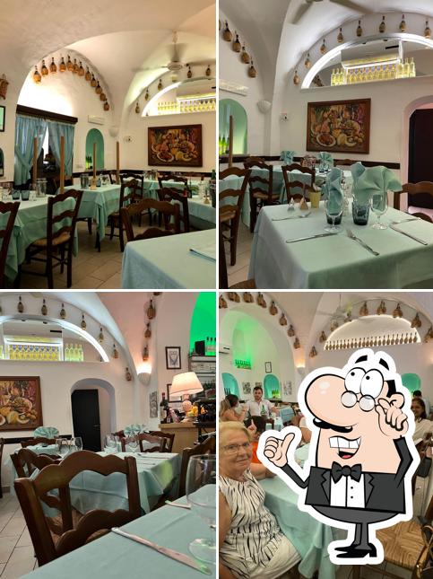 Dai un'occhiata agli interni di Al Grottino