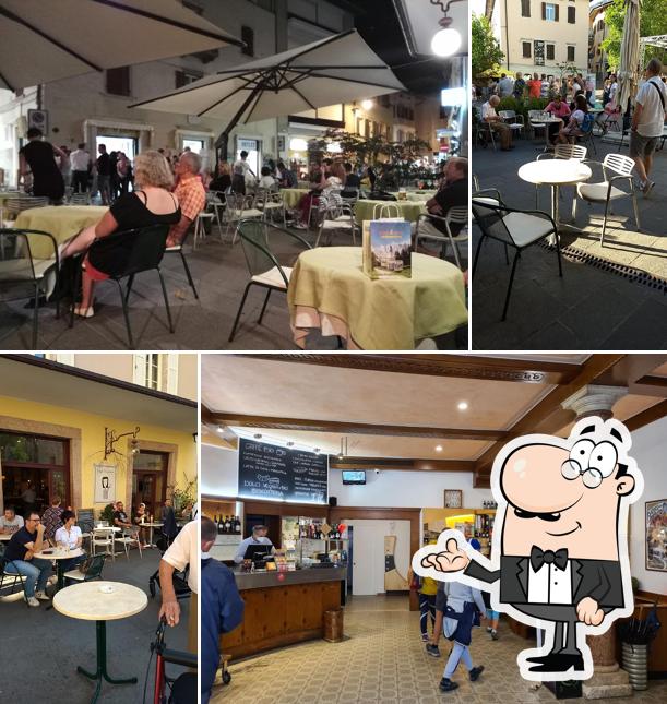 Siediti a un tavolo di Caffè Nazionale