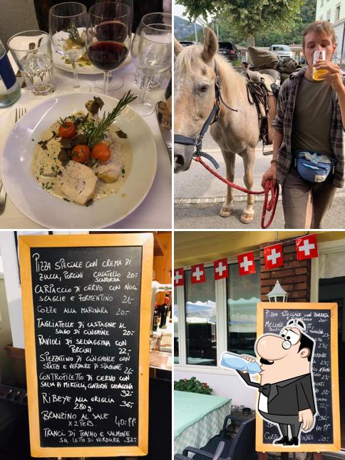 Dai un’occhiata alla foto che raffigura la bevanda e lavagna di Ristorante Stazione