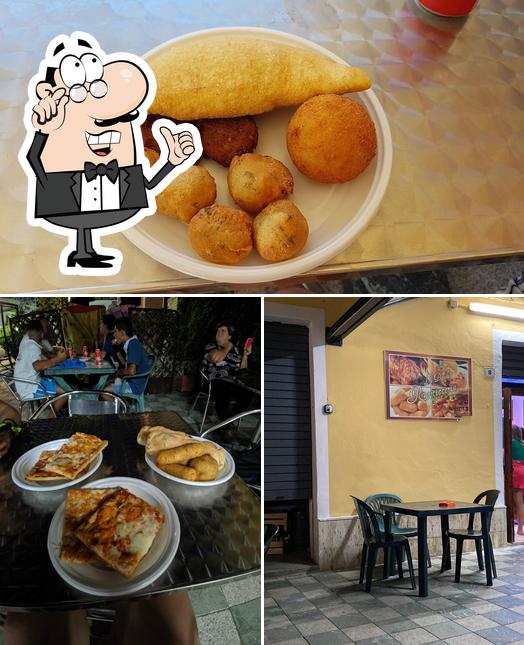 Questa è la foto che mostra la interni e cibo di La Piccola Rosticceria