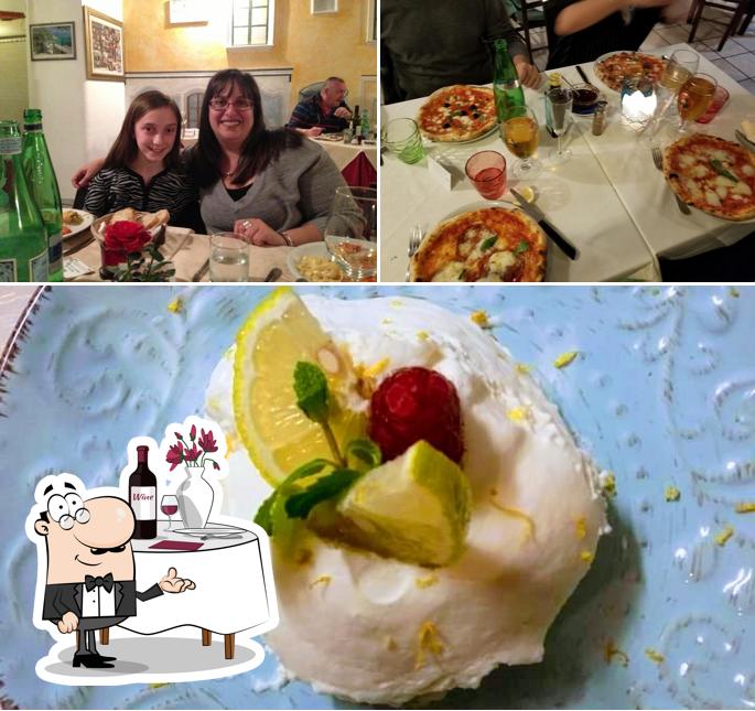 Tra le varie cose da Ristorante Pizzeria ambasciata di Capri si possono trovare la tavolo da pranzo e cibo