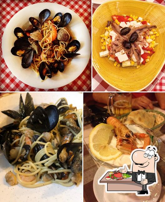 Ordina la cucina di mare a La Vela gostionica