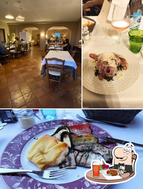 Questa è la foto che mostra la tavolo da pranzo e cibo di Trattoria Da Fernando Cà dei maghi