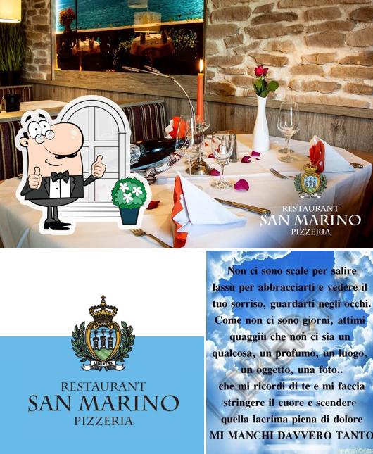 Фотография, на которой видны внешнее оформление и столики в Pizzeria San Marino