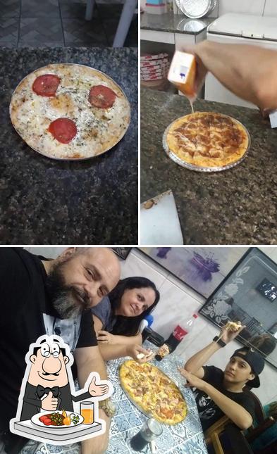 Comida em Pizzaria Sandilaine