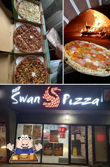 Parmi les différentes choses de la nourriture et la intérieur, une personne peut trouver sur Red Swan Pizza