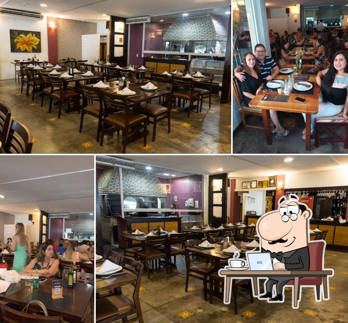 O interior do Meat's Grill Steak House