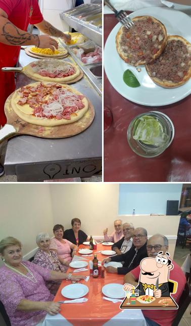 A imagem a Casanova Pizzaria & Esfiharia’s comida e mesa de jantar