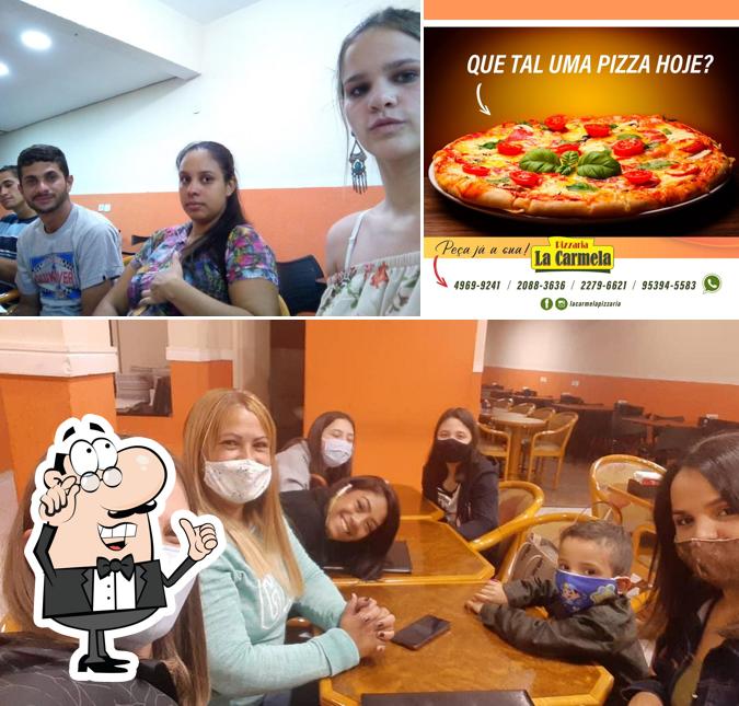 O interior do Pizzaria La Carmela