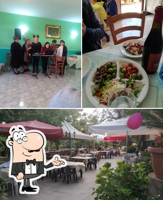 Siediti a un tavolo di Ristorante pizzeria da Gighetto