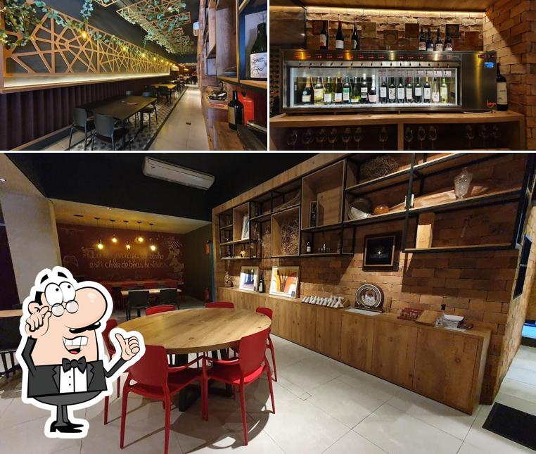 A ilustração do Bordô Gastro Vino’s interior e bebida