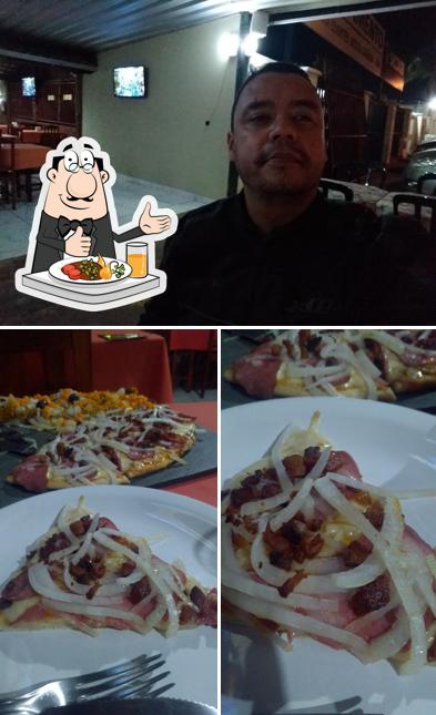 Entre diversos coisas, comida e interior podem ser encontrados no Cantina JL Pizzaria E Massas - W1