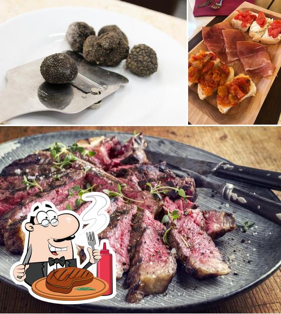 Prenditi i un pasto a base di carne a Bottega Torciano Cucina Italiana