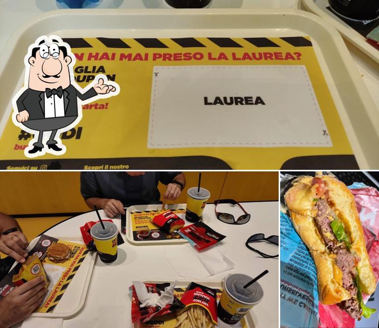 Questa è la immagine che presenta la interni e cibo di Burgez