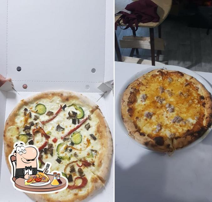 Prenditi una pizza a Risto Pizza da Aurora