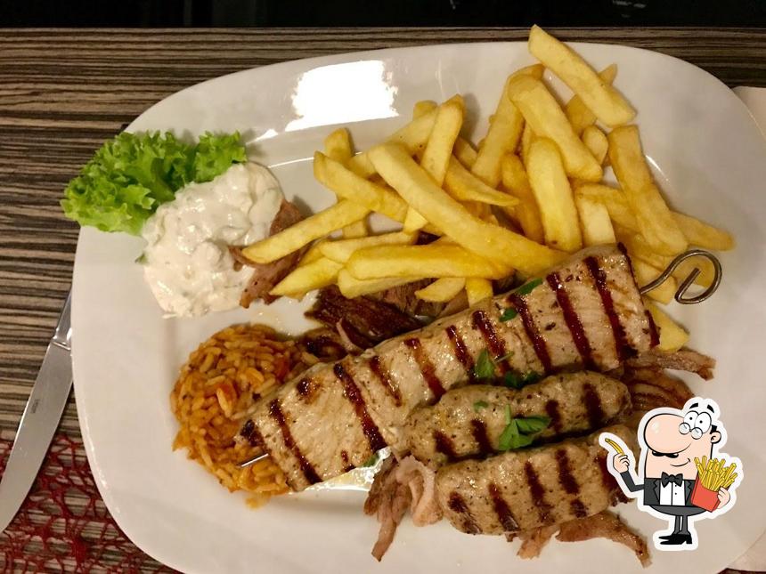 A Restaurant Alexandros vous pouvez commander des frites, des pommes frites