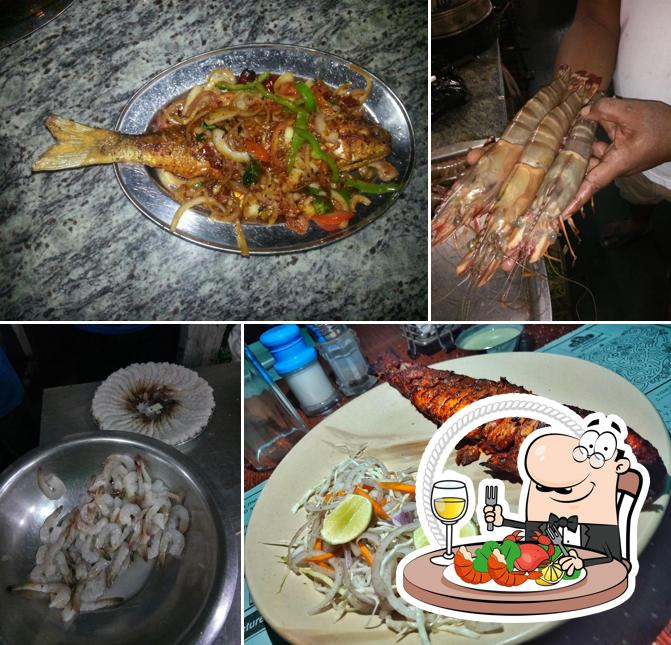 Order seafood at Atithi Restaurant