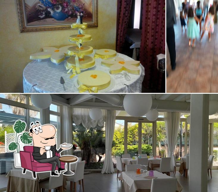Siediti a un tavolo di Hotel Ristorante Pizzeria Il Cavallino Rosso