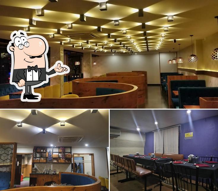 Take a seat at one of the tables at Sarovar Sabzi Sargam