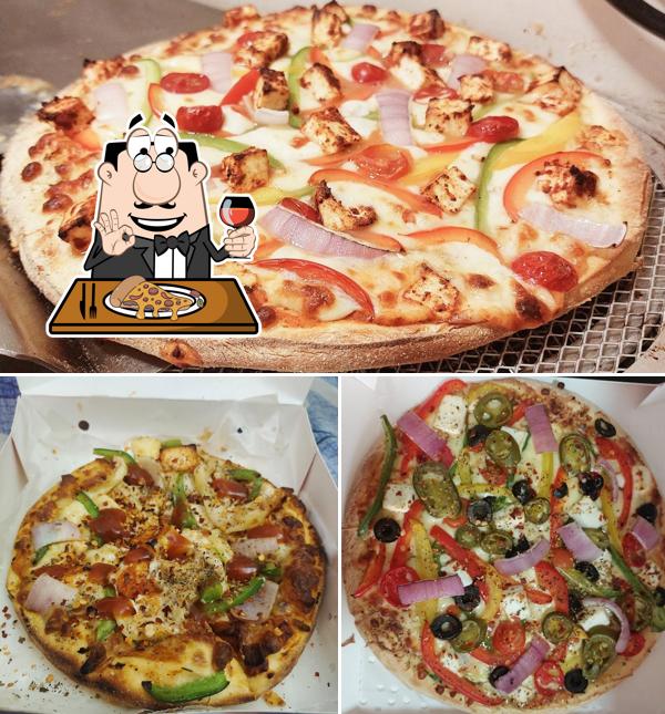 Try out pizza at Reva Cafe