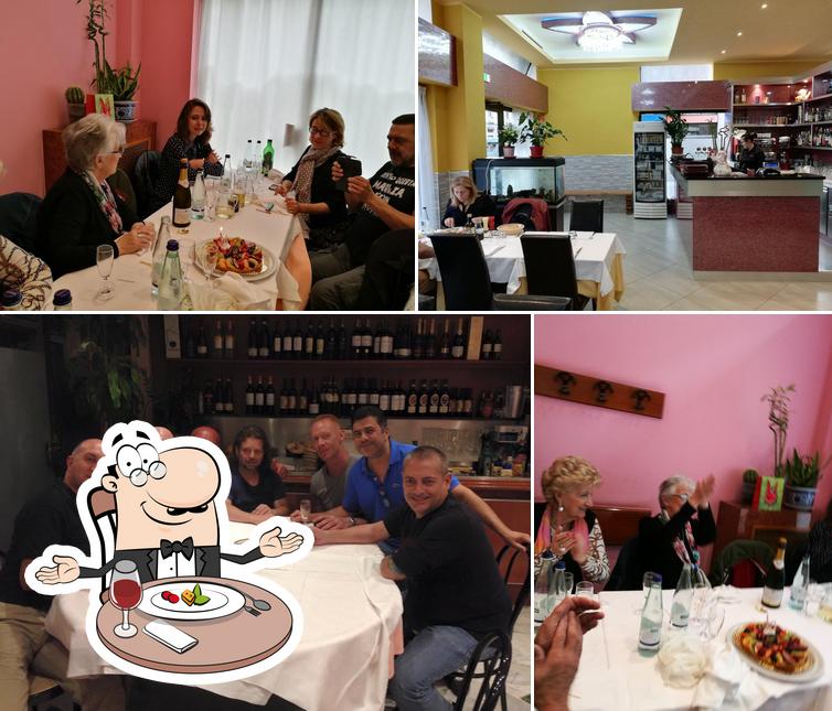 Tra le diverse cose da Ristorante Pizzeria Hobby si possono trovare la tavolo da pranzo e interni