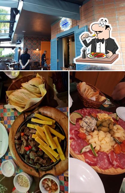 Esta é a imagem mostrando comida e interior no Gastão Bar