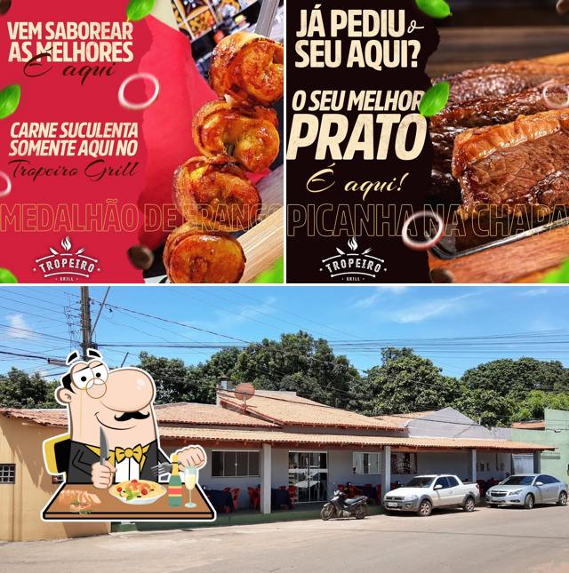 A ilustração do Tropeiro Grill’s comida e exterior